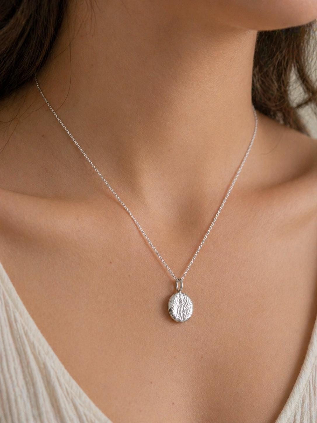 Worry bean pendant