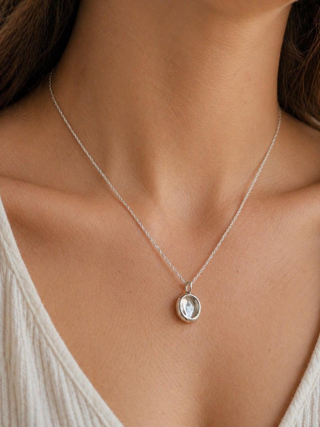 Worry bean pendant