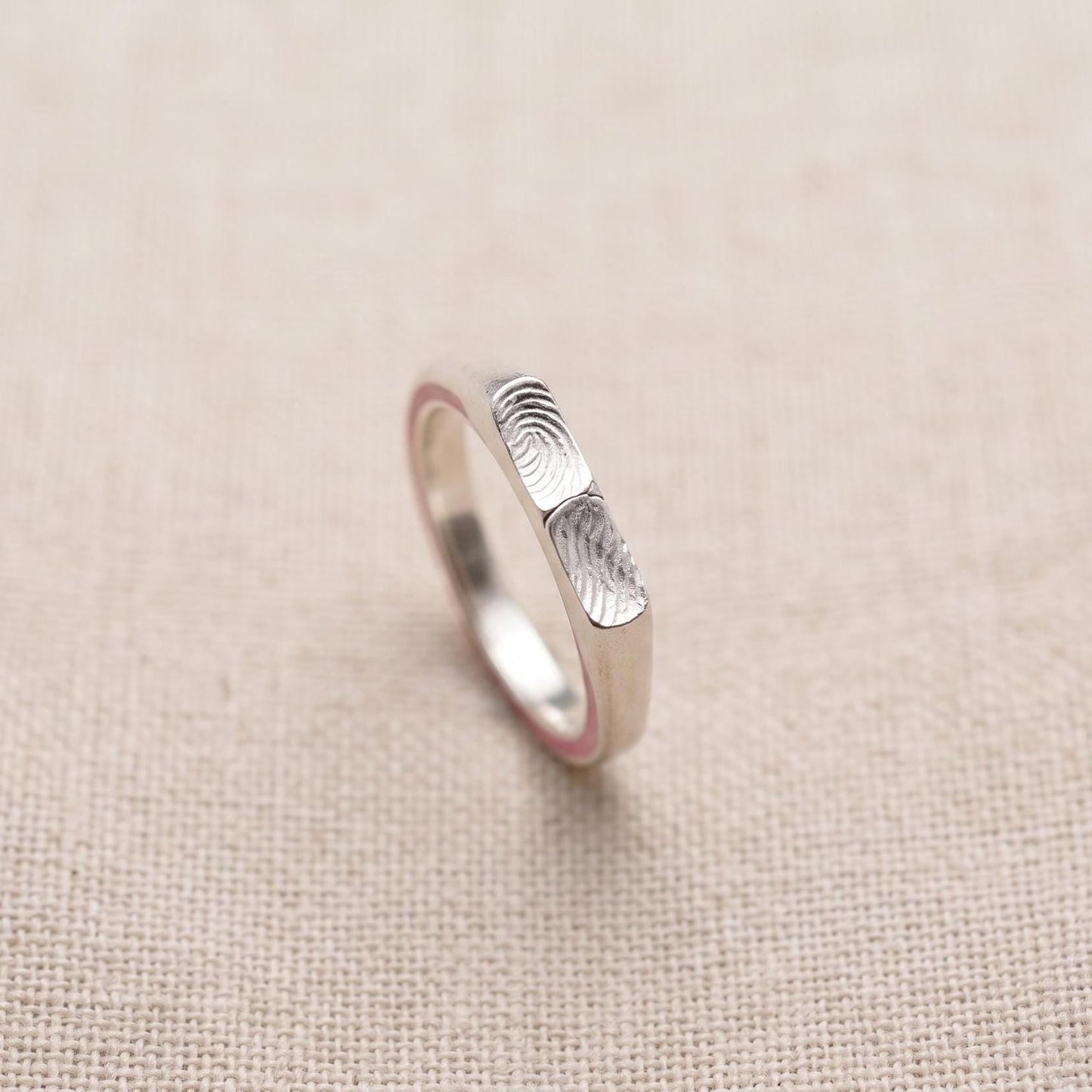 Two fingerprint signet ring