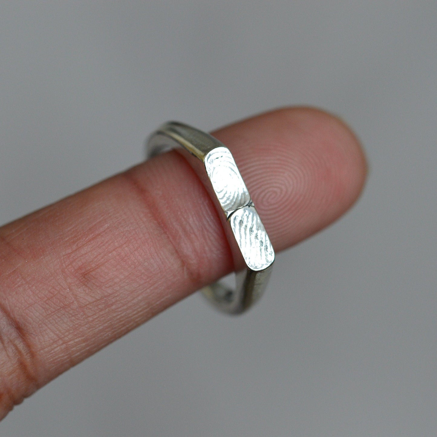 Two fingerprint signet ring