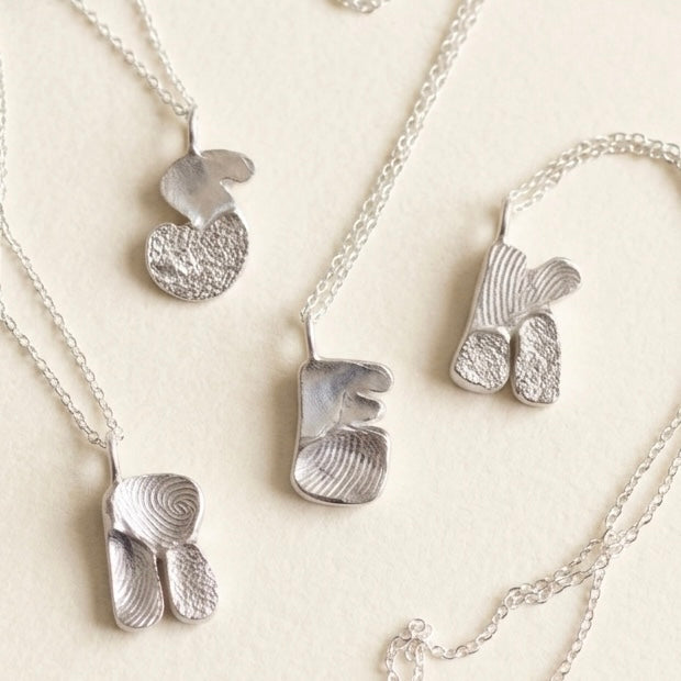 Letter fingerprint necklace