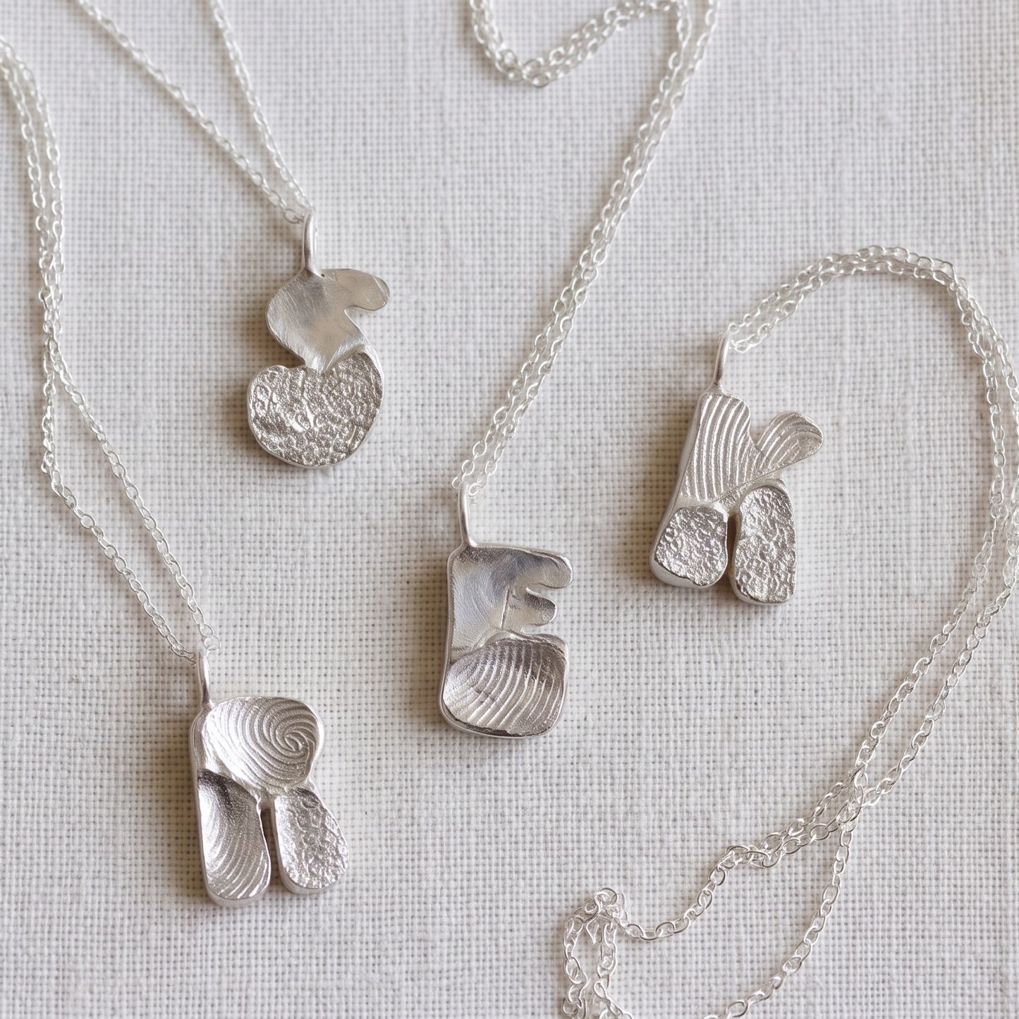 Letter fingerprint necklace