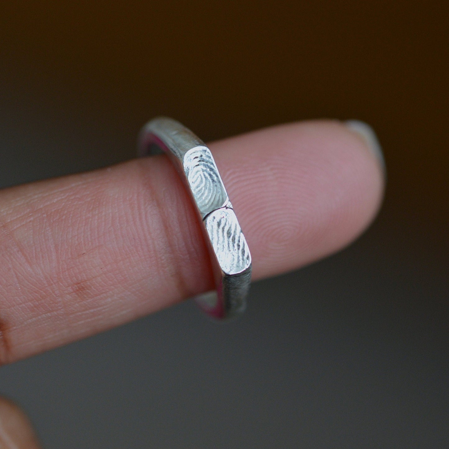 Two fingerprint signet ring
